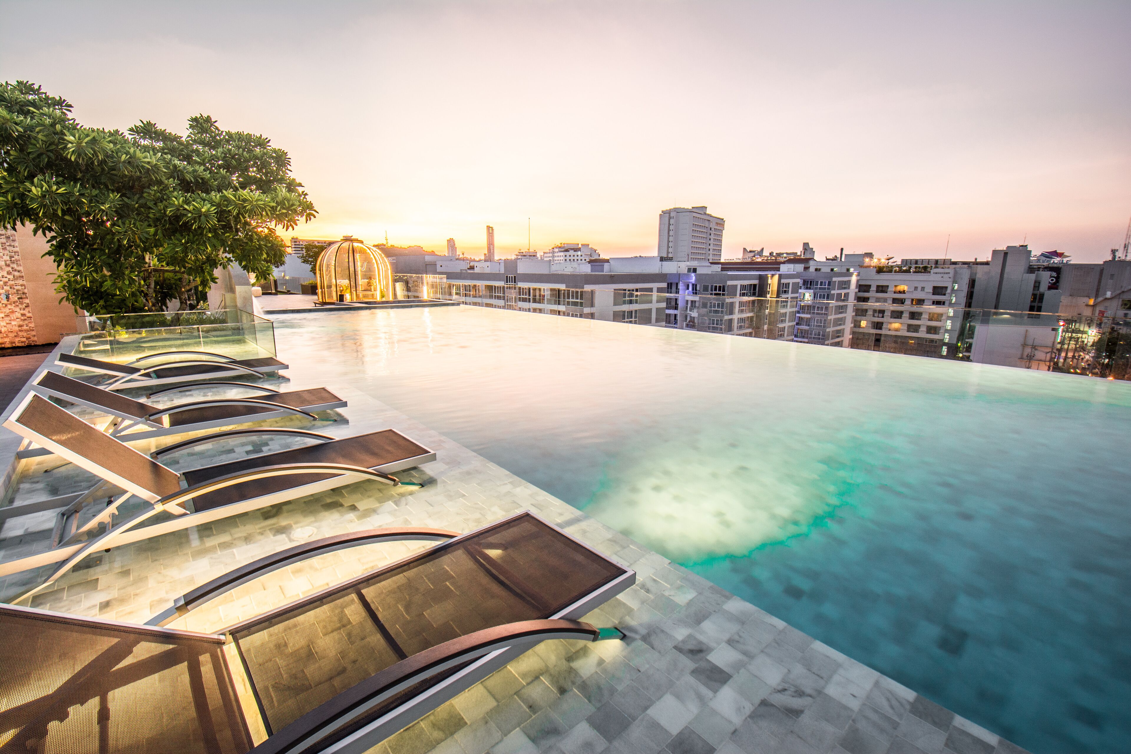 Outdoor pool, open 7:00 AM to 8:00 PM, pool umbrellas, pool loungers