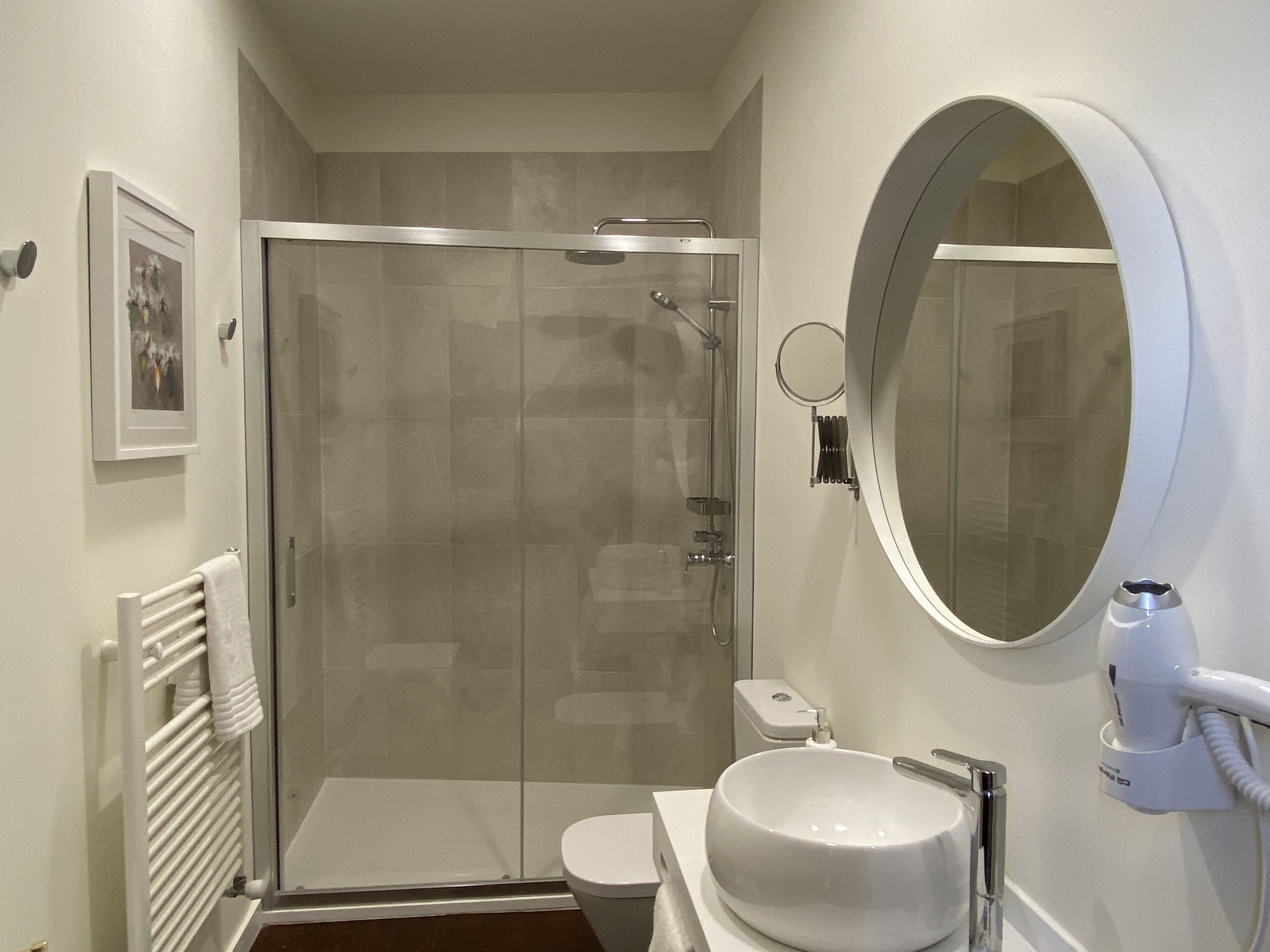 junior double room | bathroom | hair dryer, slippers, towels, soap