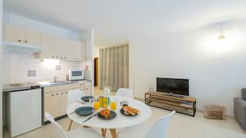 Superior Suite, with terrass | Living area | Flat-screen TV