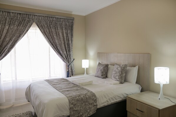 Desk, laptop workspace, free WiFi, bed sheets