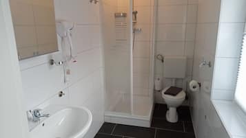 Standard House | Bathroom | Shower, hair dryer, towels