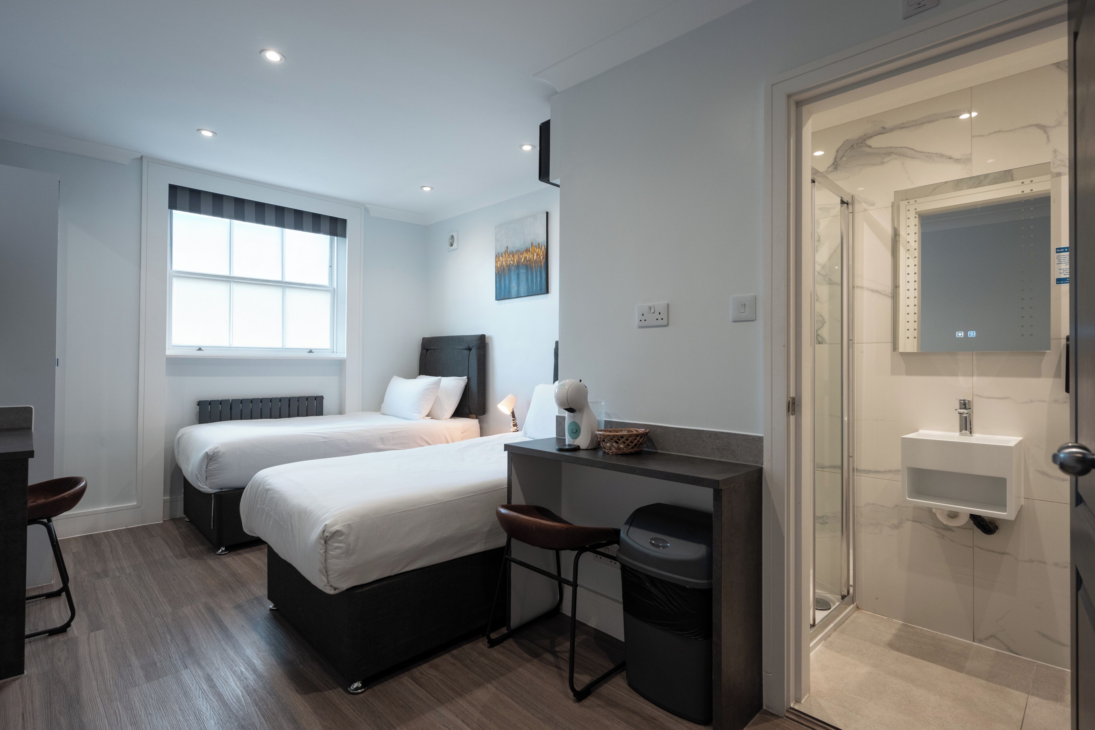 Junior Twin Studio | Iron/ironing board, cribs (free), WiFi (free), bed sheets
