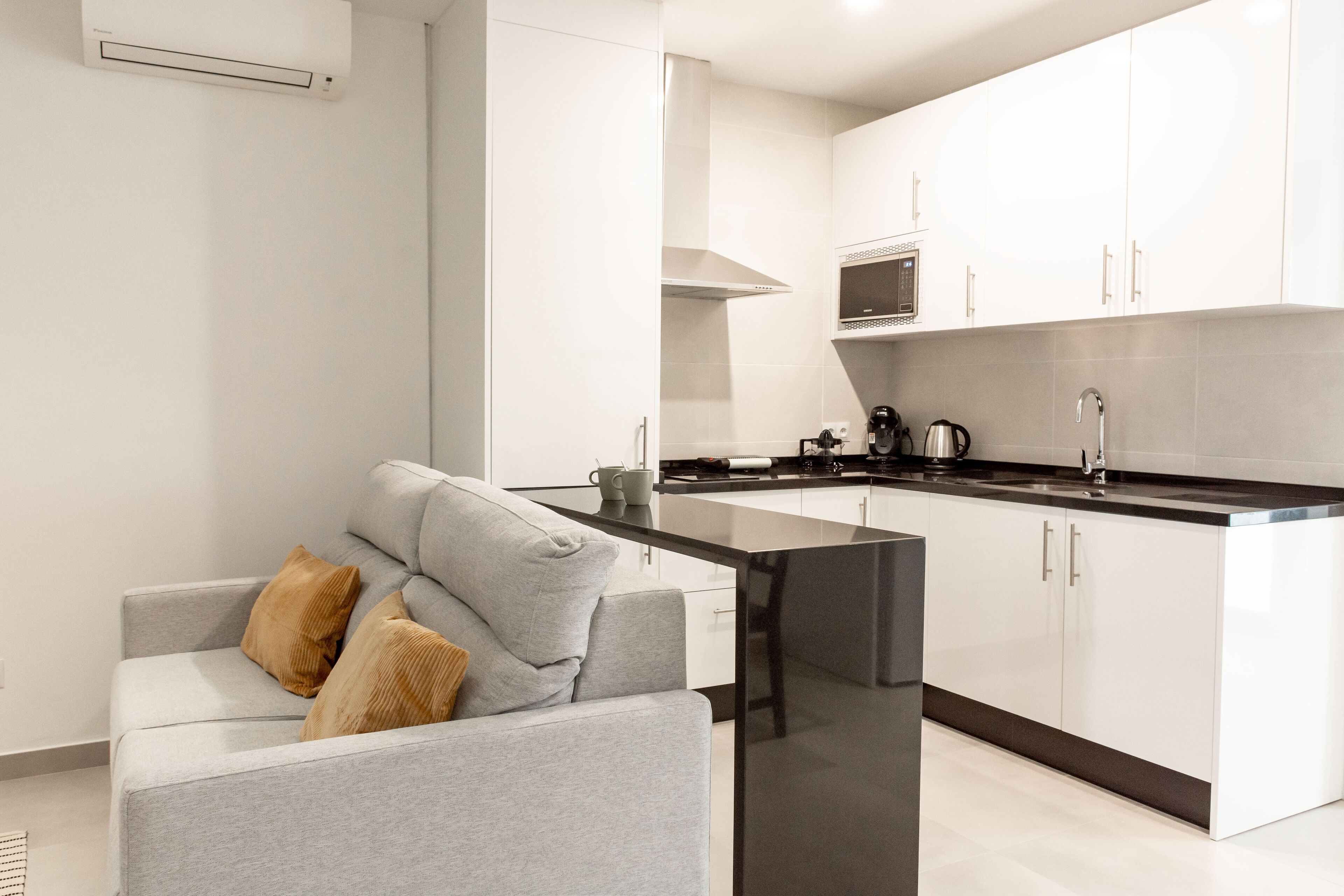 Apartment, 1 Bedroom | Living room | Flat-screen TV
