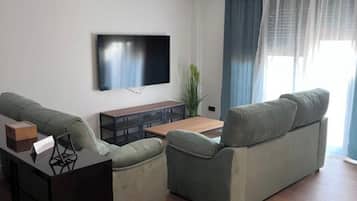 Deluxe Apartment, 3 Bedrooms | Living room