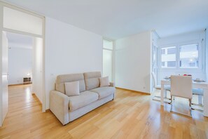 Family Apartment, 1 Bedroom (Locarno best place) | Living area | 21-inch TV with cable channels
