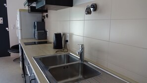 Fridge, microwave, stovetop, coffee/tea maker