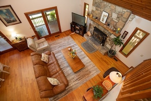 Smart TV, fireplace, books, stereo