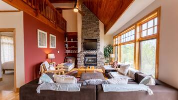Smart TV, fireplace, table football, books
