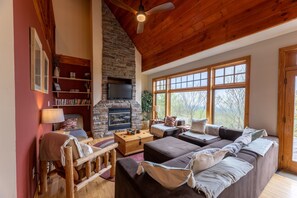 Smart TV, fireplace, foosball, books