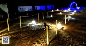 Experience the serene ambiance of our property at night.