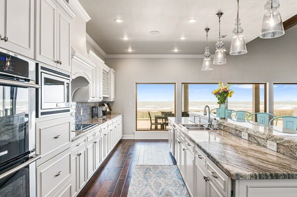 Private kitchen | Fridge, oven, coffee/tea maker, toaster - Ocean One 4 Bedroom Home by RedAwning (Port Bolivar)