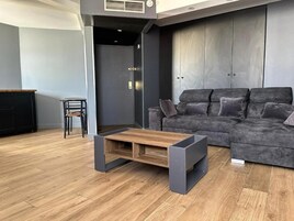 Family Room, Multiple Beds | Premium bedding, in-room safe, laptop workspace, iron/ironing board