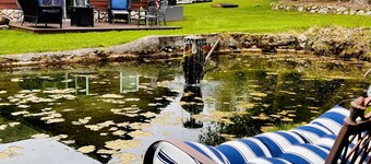 1.5 Miles from Bellaire, 8 from Torch Lake, two ponds and stream 10 acres.