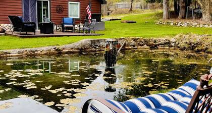 1.5 Miles from Bellaire, 8 from Torch Lake, two ponds and stream 10 acres.