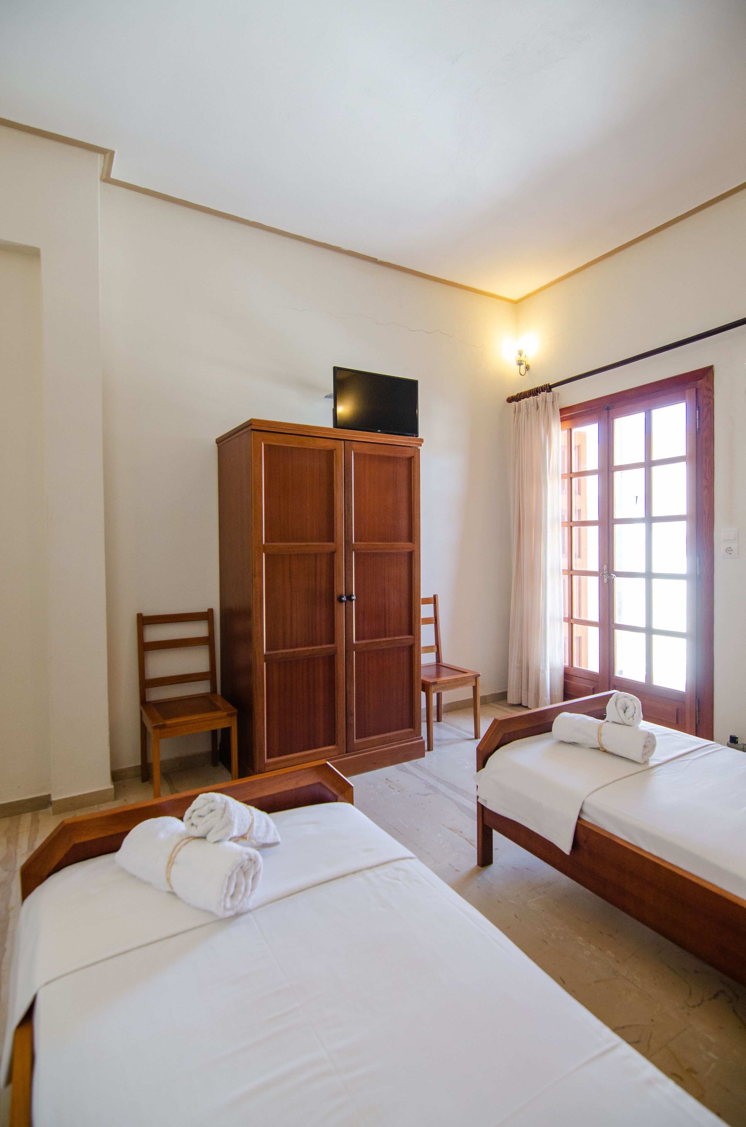 Chambre Triple Standard, 3 lits une place, vue cour intérieure | Vue de la chambre