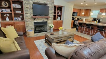 Smart TV, fireplace, DVD player, books