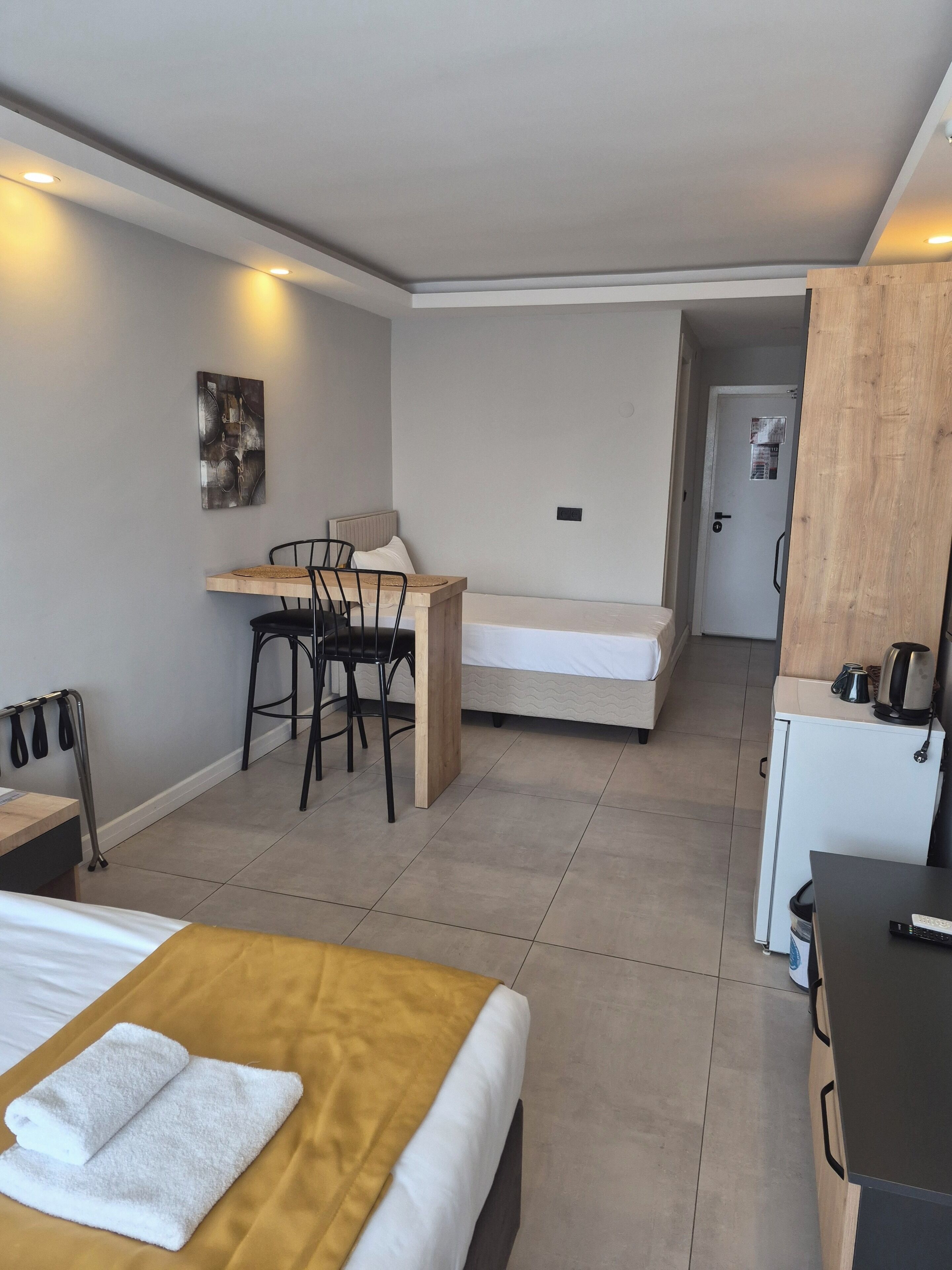 Triple Room | Desk, blackout curtains, free cots/infant beds, free WiFi