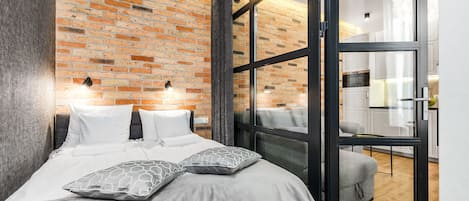 Comfort Apartment | Living area | 42-inch flat-screen TV with cable channels, TV