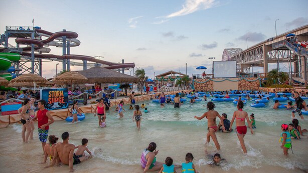A water park with multiple water slides and pools.