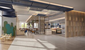 A modern restaurant with a high ceiling, exposed ductwork, and a mix of seating areas including tables and chairs.