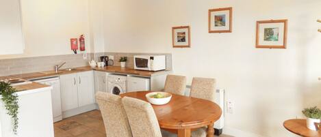 Microwave, dishwasher, highchair, cookware/dishes/utensils