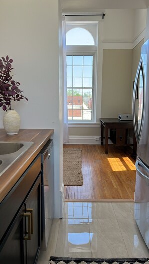 Fridge, microwave, oven, stovetop - Four Eleven Suites a Vintage Renovation in Downtown Vinton (Vinton)