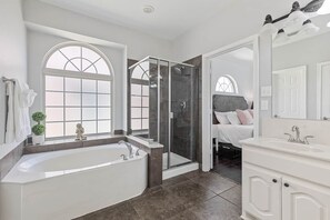 Combined shower/tub, hair dryer, towels, soap