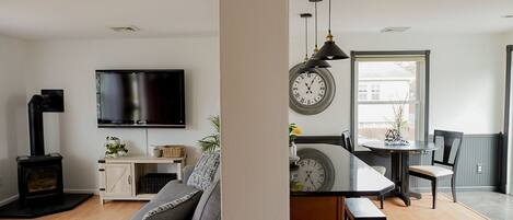 Smart TV, fireplace, table football, books