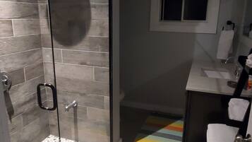 Shower, towels, soap, toilet paper