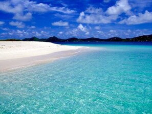 On the beach, sun-loungers, beach towels