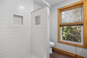 Combined shower/tub, hair dryer, towels, soap