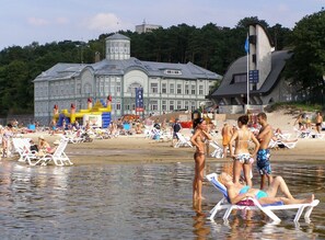 On the beach, sun-loungers, beach towels