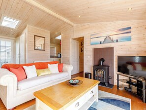 Living area - A Nordic Style 6 berth Luxury Lodge with raised veranda on 3 sides. (Derby)