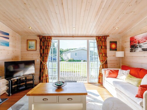 A Nordic Style 6 berth Luxury Lodge with raised veranda on 3 sides.