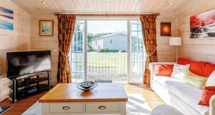 A Nordic Style 6 berth Luxury Lodge with raised veranda on 3 sides.