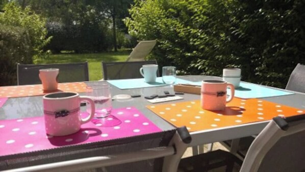 Enjoy a romantic meal for two in our garden setting, complete with a beautifully set table and serene surroundings.