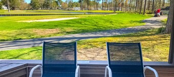 Quiet townhome on the golf course with deck, central AC & paid-access pool