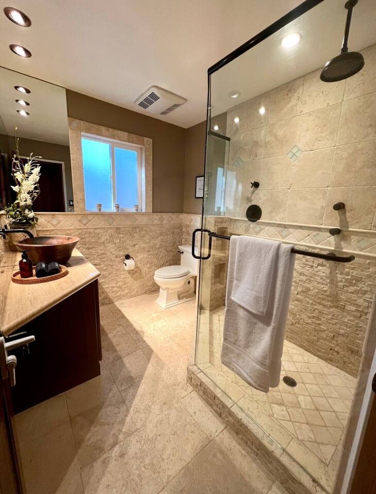 Shower, hair dryer, towels, soap