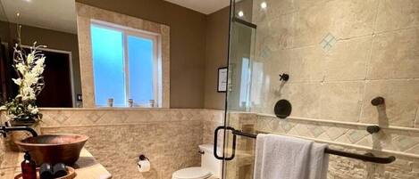 Shower, hair dryer, towels, soap