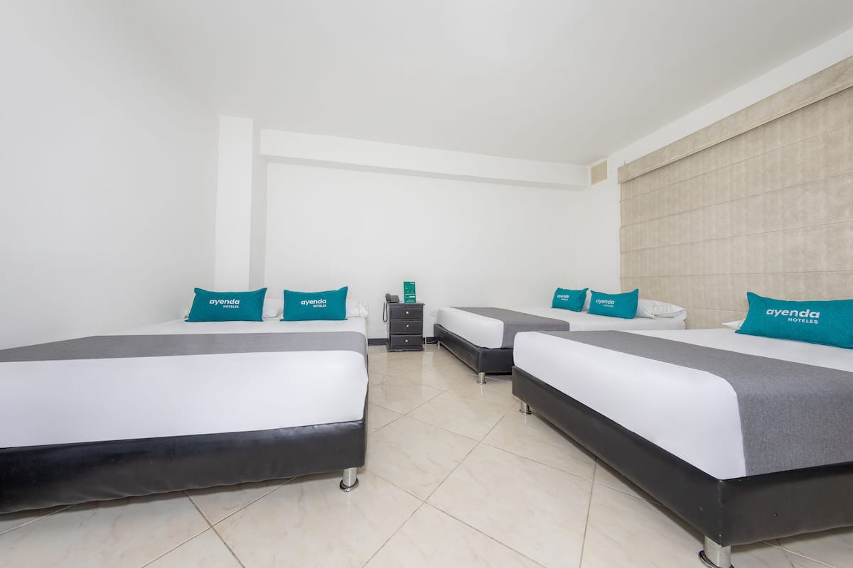 Habitación cuádruple superior | Ropa de cama hipoalergénica, wifi gratis y ropa de cama