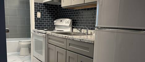 Fridge, stovetop, coffee/tea maker, toaster