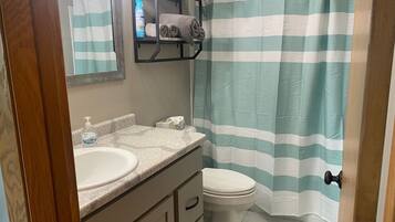 Ensemble douche/baignoire, savon
