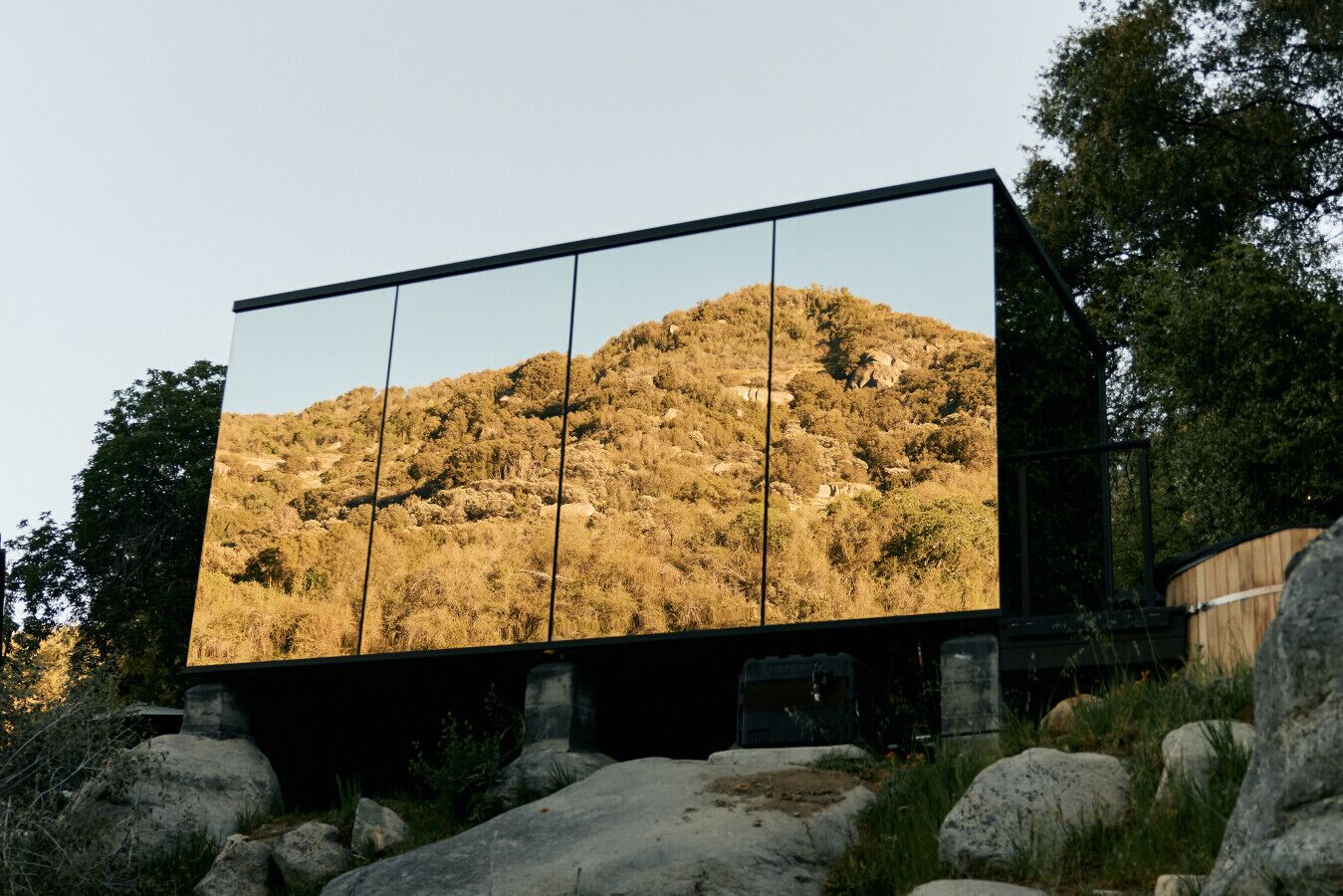 A modern building with a large reflective glass facade.