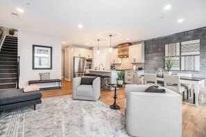 TV - Spacious Downtown Retreat: Private Deck & Balcony (Holland)