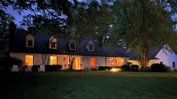 A two-story house with a brick facade, multiple windows, and a well-maintained lawn. - Fox Knoll 1-Studio-Sleeps 2-Beautiful Setting! Indy 500! Grand Park, Concerts! (Indianapolis)