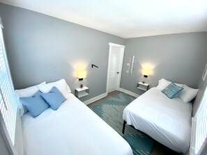 2 bedrooms, desk, iron/ironing board, travel cot