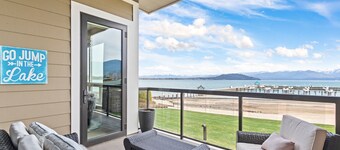 Lake view condo with WiFi, balcony, fireplace, & shared pool/hot tub/grills