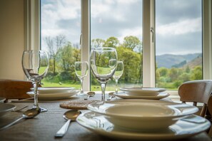 Enjoy a formal dining experience with a scenic view of the surrounding landscape.
