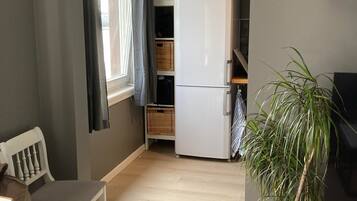 Apartment, 1 Bedroom, River View | Living area | TV