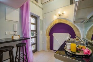 Fridge, microwave, stovetop, dining tables